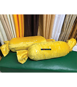 Yellow Sausage pillow with Gold print